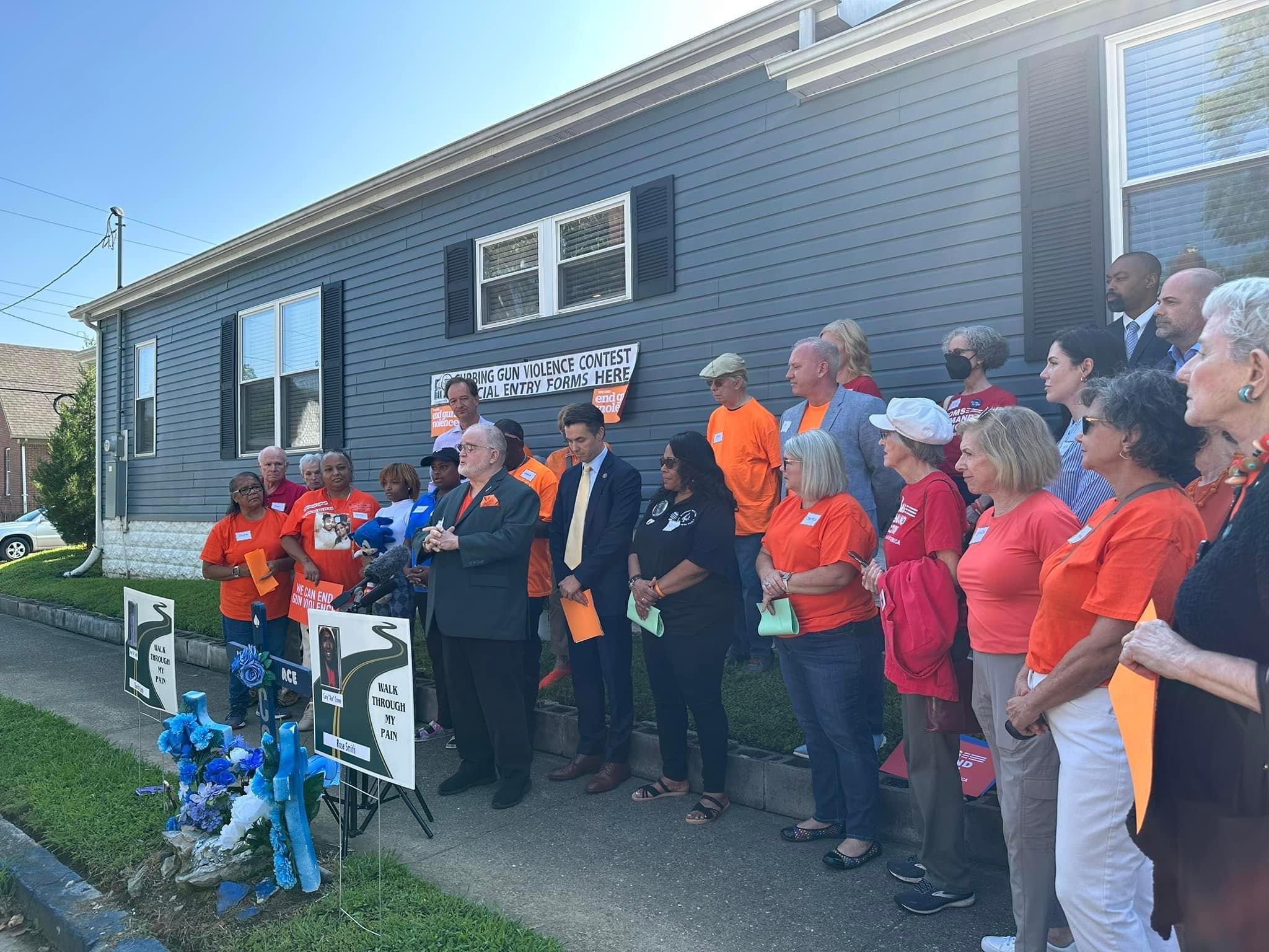Large group gathered outside ACE Project building at Curbing Gun Violence event