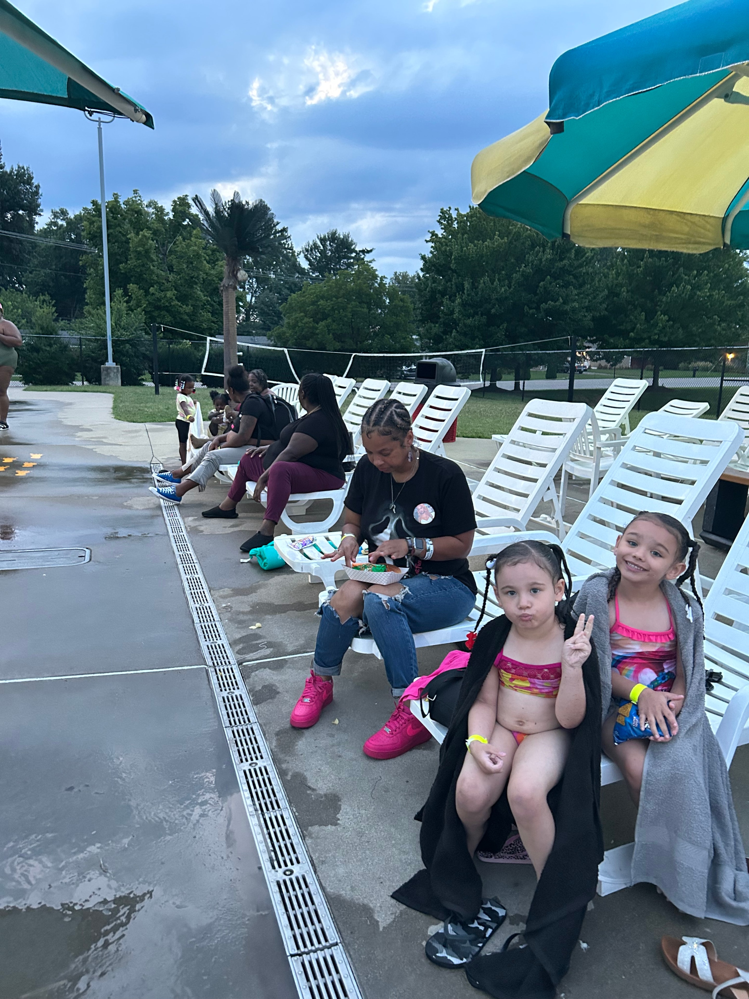 Children and youth enjoying ACE Project summer pool outing