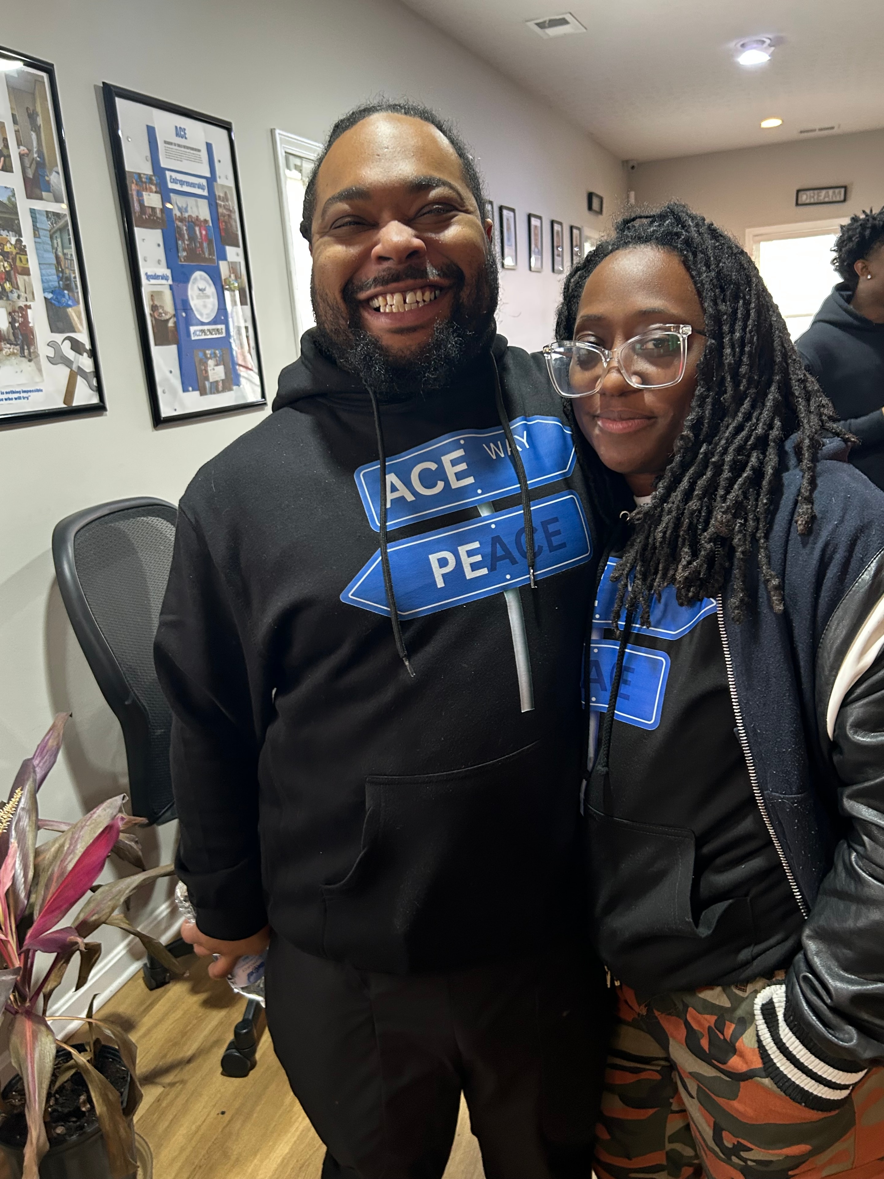 Two community members at ACE Project event